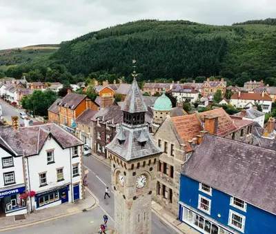 an aerial view of a town with a clock tower at 2 Bed in Knighton oc-t29330 in Felindre