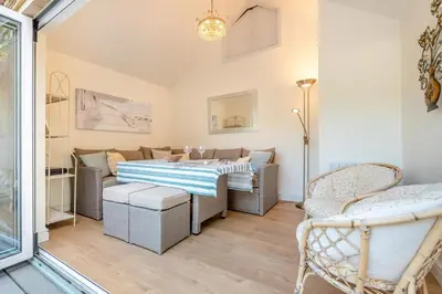 a living room with a couch and a table and chairs at 3 Bed in Clyro oc-r29347 in Clyro