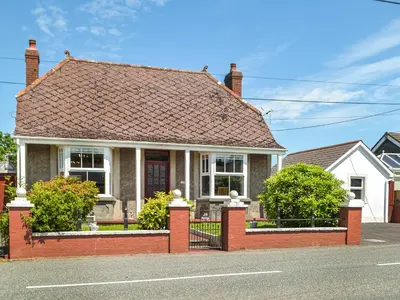 a house with a brown roof at Ferwig in New Quay