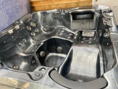 a close up of a car engine in a garage at Synod Farm Cottage, 5 Person Hot Tub, Pets Welcome in Llandysul