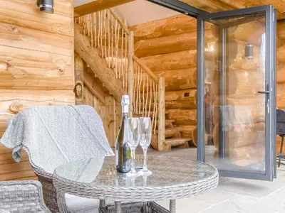 a dining room with a table and chairs at Hope Hideaway in Leighton