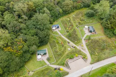 an aerial view of an old house with a garden at Collen in Llanarth