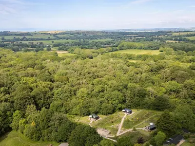 an overhead view of a field with trees at Bedwen in Llanarth