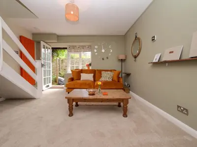 a living room with a couch and a coffee table at The Lilley Pad in Ludlow Cosy, Central, Perfect for Couples, Netflix & Parking Permit in Ludlow