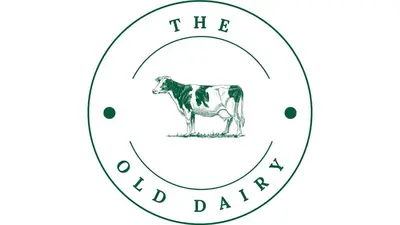a badge with a cow in the middle at The Old Dairy in Yarpole