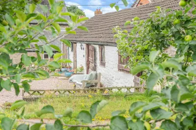 a cottage with a garden in front of a house at 1 Bed in Hay-on-Wye oc-c29788 in Hay-on-Wye