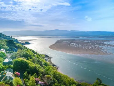 an aerial view of the shoreline of a beach at 5 Bed in Aberdovey oc-t29402 in Aberdyfi