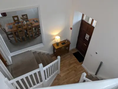 an overhead view of a room with stairs and a table at 2 Chapel Nazareth in Penrhyndeudreath