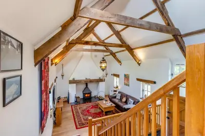 a view of the living room and dining room from the loft at 1 Bed in Llwynygroes oc-y29714 in Llangeitho
