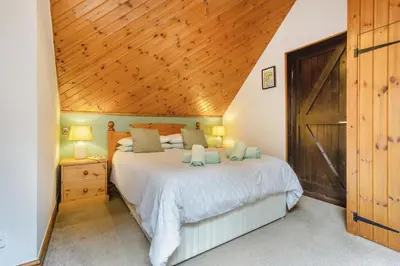 a bedroom with a bed and a wooden ceiling at 2 Bed in Devils Bridge oc-d29575 in Devils Bridge