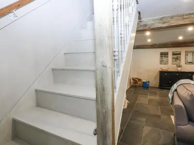 a staircase leading up to the basement of a house at Islwyn in Bala