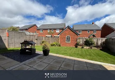 a brick house with a gazebo in a yard at 3 Bedroom Modern Property with Parking in Shrewsbury