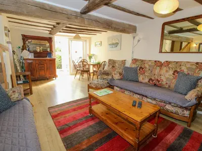 a living room with a couch and a coffee table at Old Bricklayer's Arms in Bishops Castle