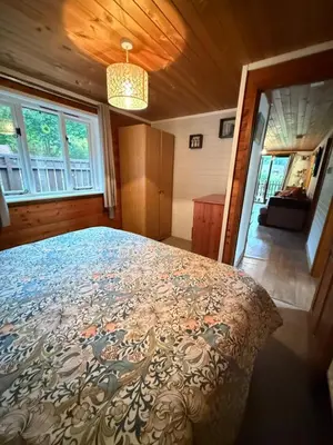 a bedroom with a large bed in a room at Glamping Life Retreat in Nantmel