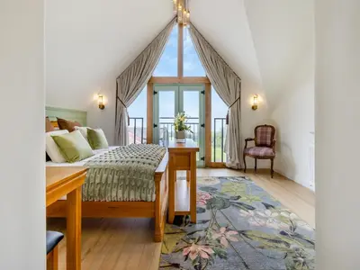 a bedroom with a bed and a desk at The Lodge Spa - Uk47837 in Church Pulverbatch