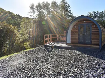 a small cabin in the middle of a forest at Glampio Trysor Merddwr-Ukc5826 in Llangwm