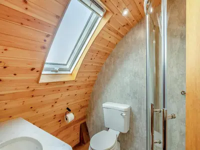 a bathroom with a toilet and a skylight at Primrose - Uk42358 in Saint Harmon