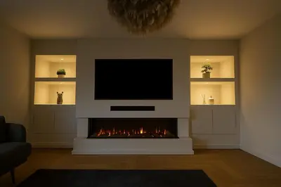 a living room with a fireplace with a television at MODERN 3 BEDROOM PROPERTY WITH FREE DRIVEWAY PARKING by SHIRE STAYS in Shrewsbury
