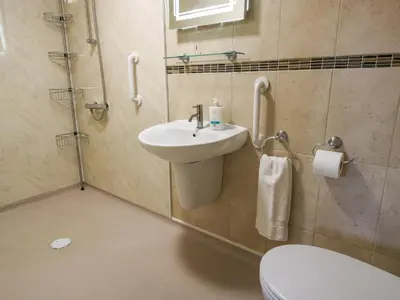 a bathroom with a sink and a toilet at The Cart House in Shrewsbury