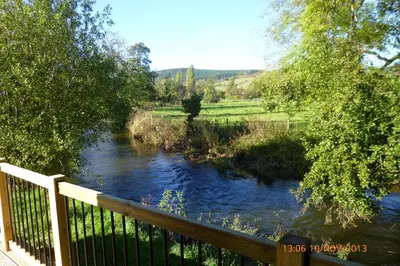 a view of a river from a bridge at Ash Lodge in Craven Arms