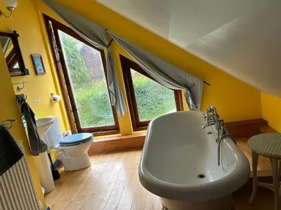 a bathroom with a sink and a toilet at Happy Horse Cottages in Sennybridge