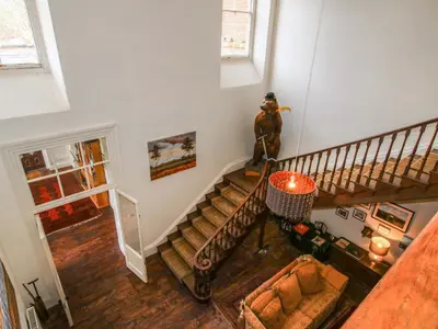 an overhead view of a staircase in a house at Caynham Court in Ludlow