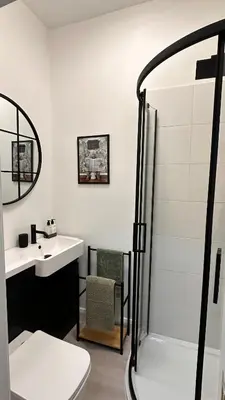 a bathroom with a shower and a sink at Bryn Aber-The House on the Hill in Llangollen