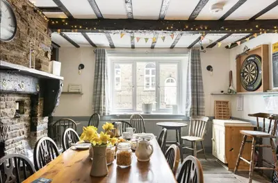 a dining room with a table and chairs at The Royal Oak, Gladestry in Gladestry