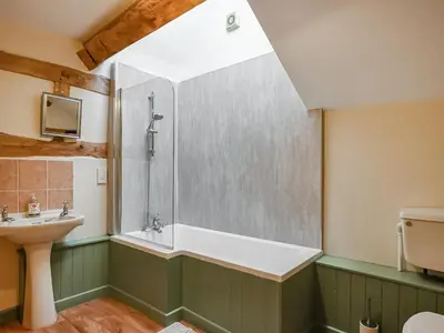 a bathroom with a shower and a sink at Uk46590 - Longmynd in Church Stretton