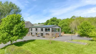 an aerial view of a house with a yard at 1 Little Broomcroft in Shrewsbury