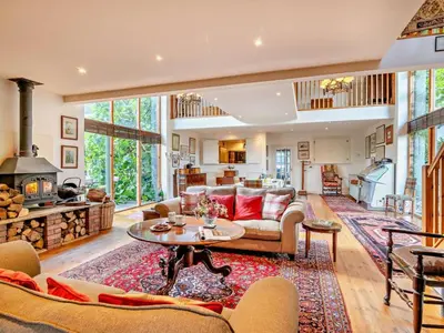 a living room with a couch and a table at 2 Bed in Kington oc-92986 in Lyonshall