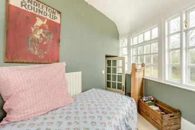 a bedroom with a bed and a painting on the wall at 6 Bed in Llanfilo oc-e30630 in Llandefalle