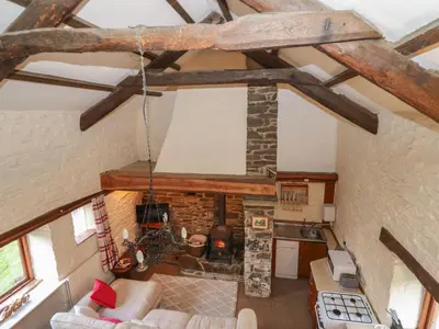 an overhead view of a living room with wooden beams at Ty Tarw in Llanybydder