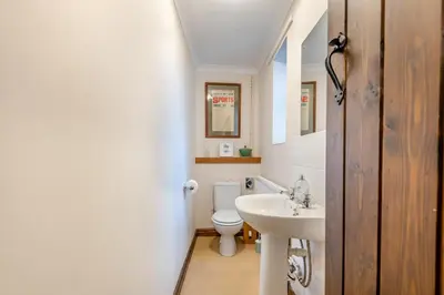 a bathroom with a white toilet and a sink at 3 Bed in Leominster oc-r30485 in Yarpole