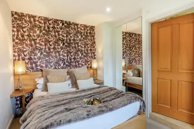 a bedroom with a large bed with a large wall at 14 Bed in Llansanffraid oc-b30382 in Llanymynech