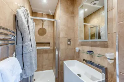 a bathroom with a sink and a mirror at 14 Bed in Llansanffraid oc-b30382 in Llanymynech