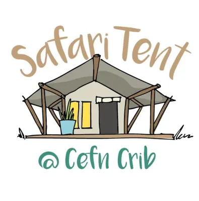 a tent with the words safari tent a get club at Cefn Crib Safari Tent in Machynlleth