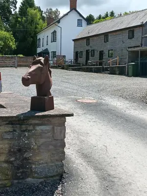a statue of a horse on the side of a road at Herdsman's Hideaway in Leominster