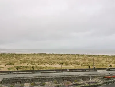 a view of the beach and the ocean at Sandpiper Apartment in Barmouth