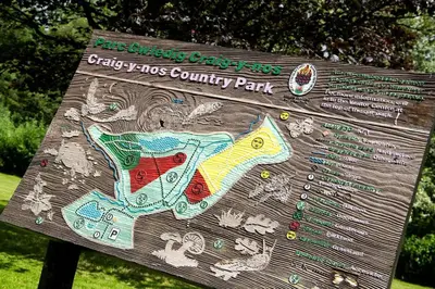 a sign for a park with a map on it at 3 Bed in Pentre Bach oc-t30863 in Pentre-bâch