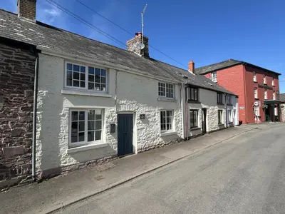 an old white building on the side of a street at 2 Bed in Trecastle oc-c30837 in Trecastle