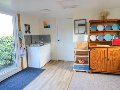 a kitchen with a sink and a counter top at Shed Your Blues in Hereford