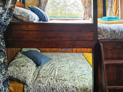 a bed in a room with a window at Rosie - Uk49025 in Pencarreg