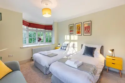 a bedroom with two beds and a couch at 5 Bed in Church Stretton oc-t30413 in Church Stretton