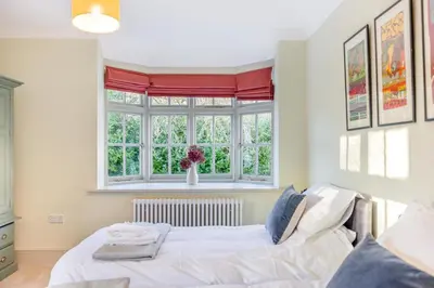 a bedroom with a bed and a window at 5 Bed in Church Stretton oc-t30413 in Church Stretton
