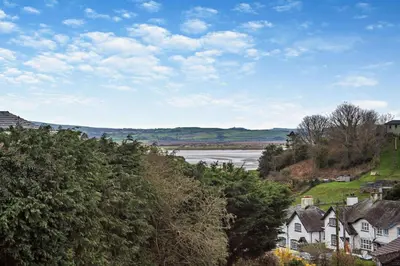 a view of a town with a river and houses at 3 Bed in Aberdovey oc-n29124 in Aberdyfi