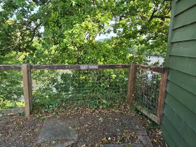 a fence with a sign that says exit farms at The Loft at Box Bridge in Brecon