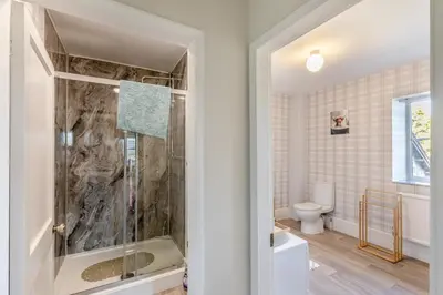 a bathroom with a shower and a toilet at 5 Bed in Hundred House oc-l31090 in Hundred House