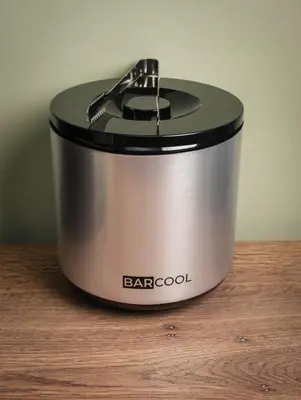 a slow cooker sitting on top of a wooden table at The Bryntirion Inn in Llandderfel