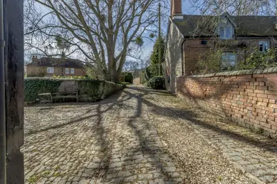 a shadow of a tree on a brick road at 1 Bed in Culmington oc-t31830 in Culmington
